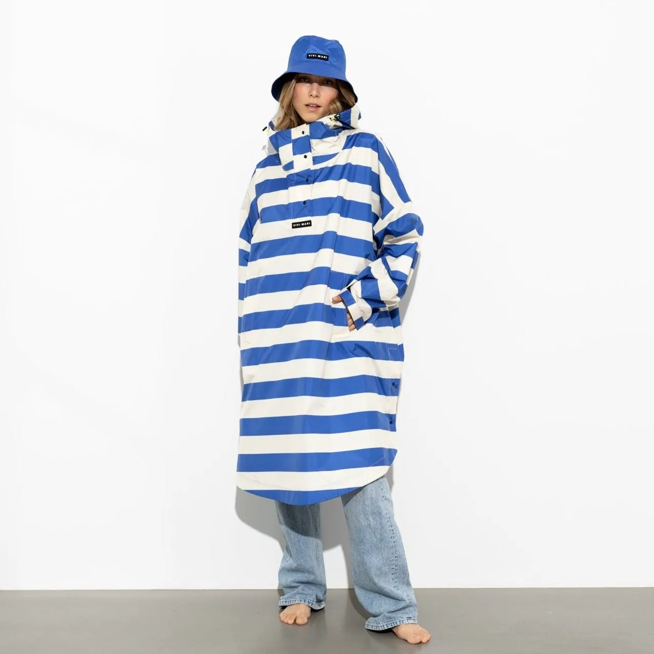 Raincoat bold stripes - blue/sand